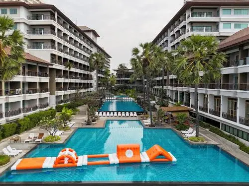 His beachfront resorts often feature open-air architecture